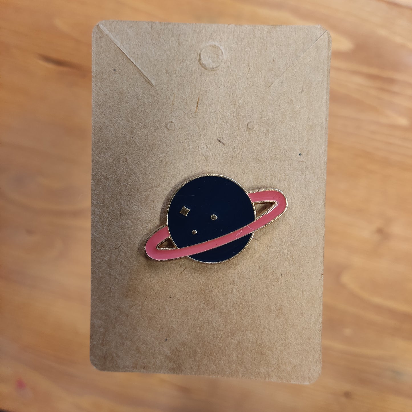 dark blue saturn pin