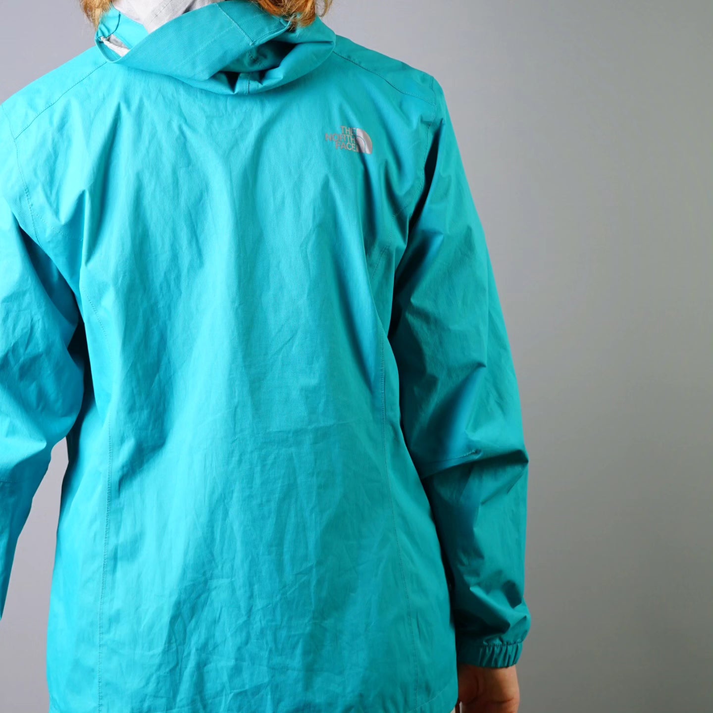 northface turquoise windbreaker