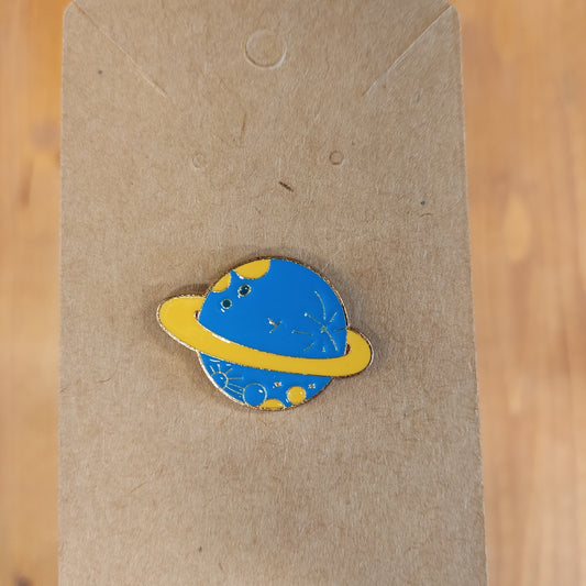 blue and yellow saturn pin