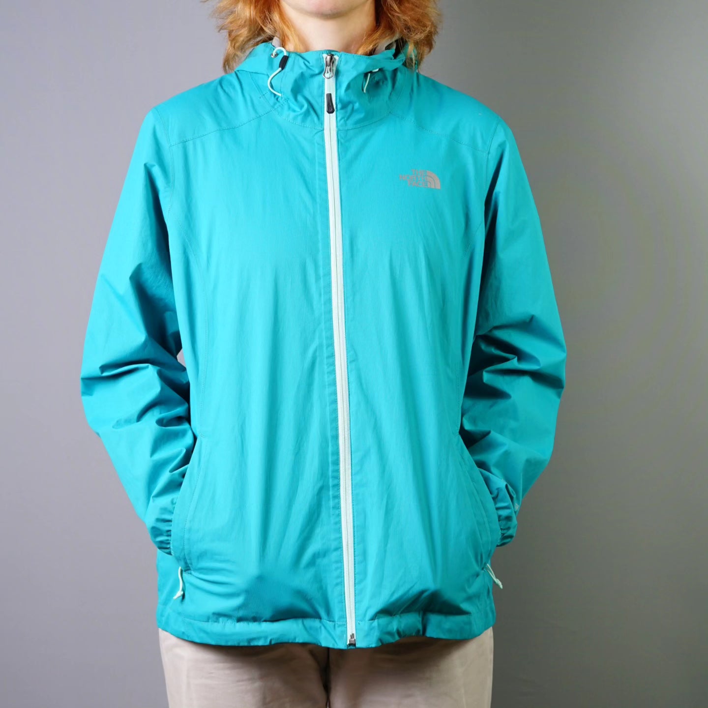 northface turquoise windbreaker